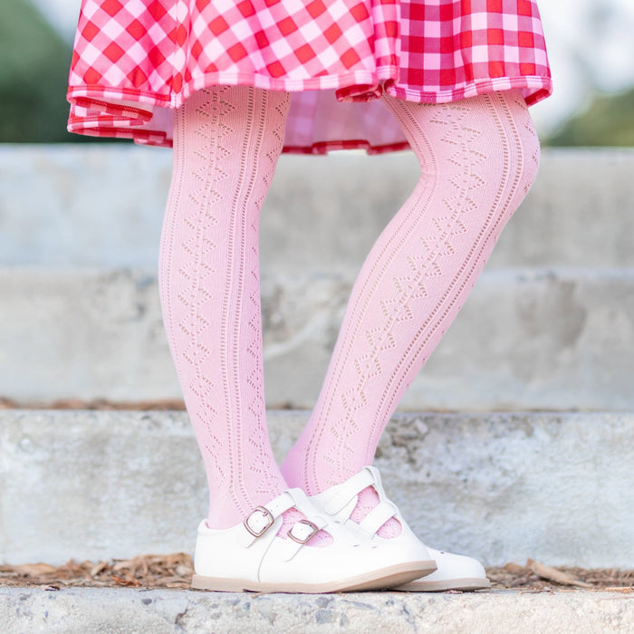 girls open knit tights in light pink paired with red and pink gingham dress for Valentine's Day