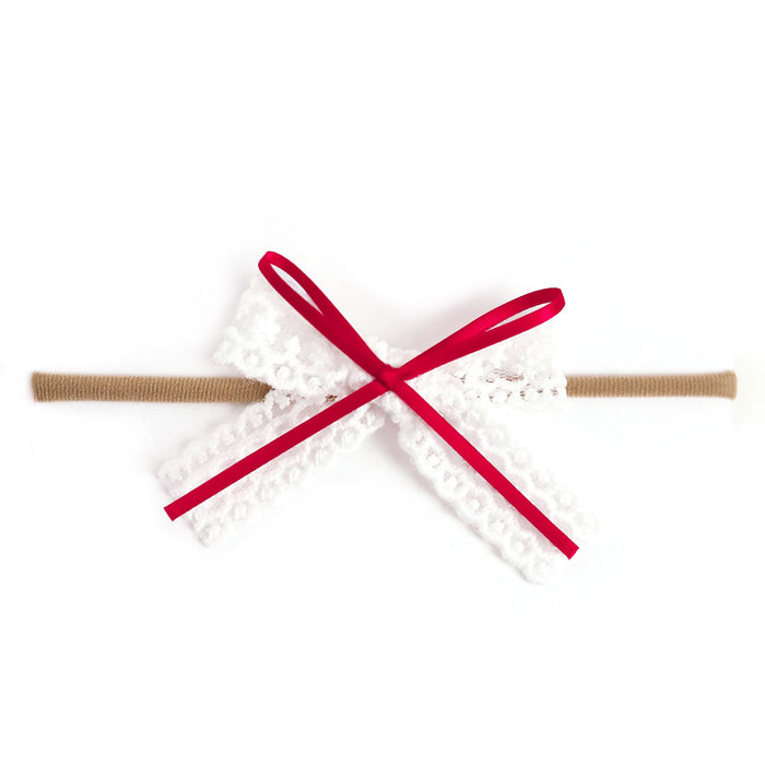 Valentin's baby bow with white lace and red satin ribbon on stretchy nylon headband