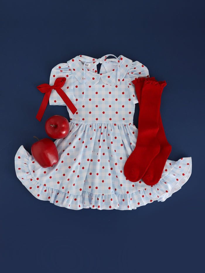 girls light blue and white gingham and apple print short sleeve twirl dress with collar paired with apples, bright red pointelle lace top knee socks and bright red satin hair bow
