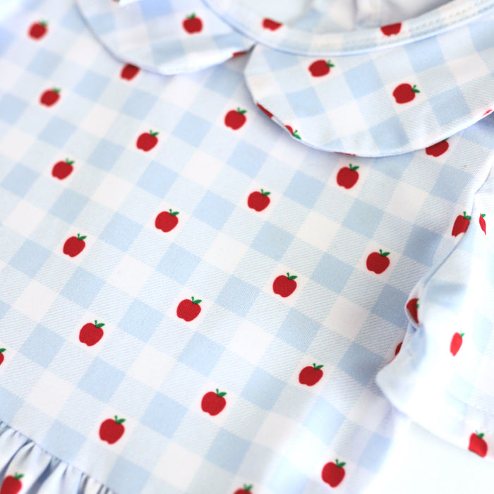 closeup of girls' light blue and white with petite apple print dress bodice for back to school and apple picking season