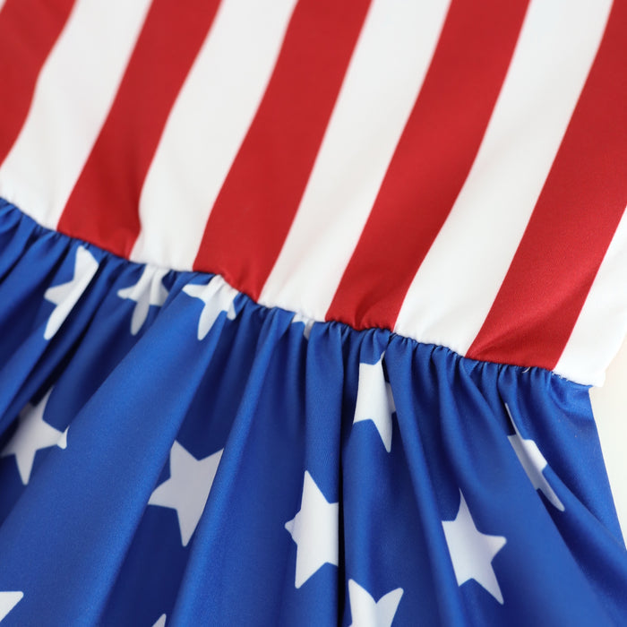 close up of American flag inspired red and white stripe bodice with blue and white star skirt