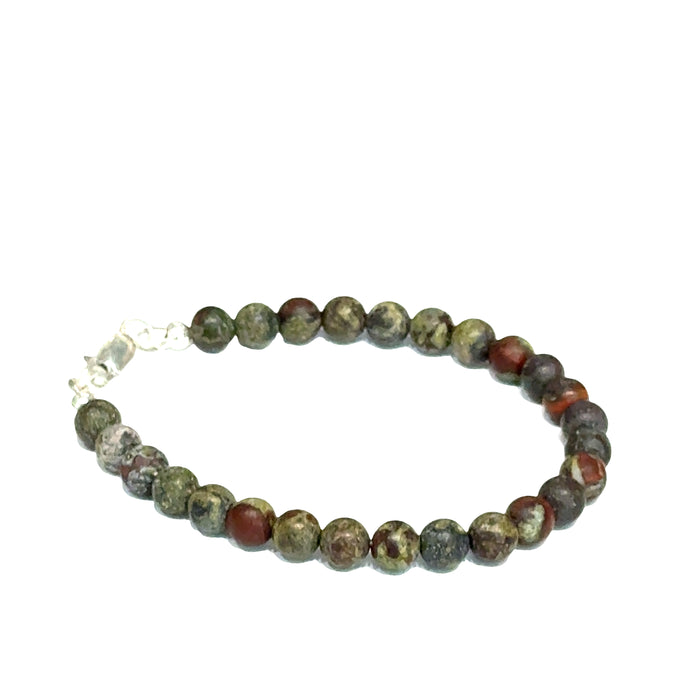 Dragon Blood Jasper gemstone beaded bracelet with sterling silver  lobster claw clasp showing red and green natural patterns  on a white background, right angle view.