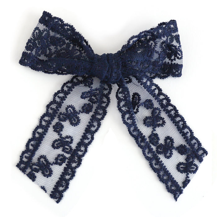 girls' hand tied lace bow in navy bliue on alligator clip