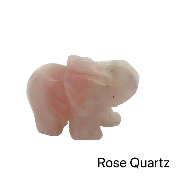 Carved Crystal Elephant Figurine Rose Quartz on white front angle view