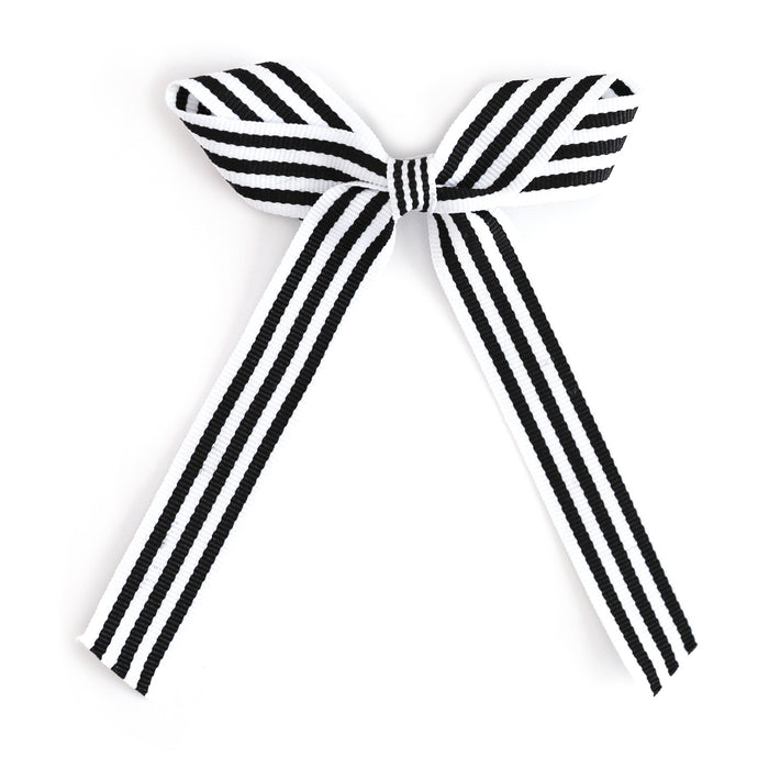 girl's black and white striped ribbon bow on alligator clip for Halloween