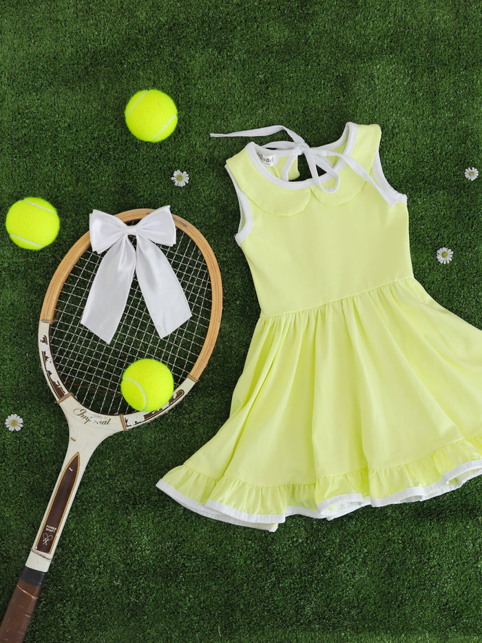 girls' lemon-lime solid sleeveless twirl dress with white trim and collar styled for tennis vibes
