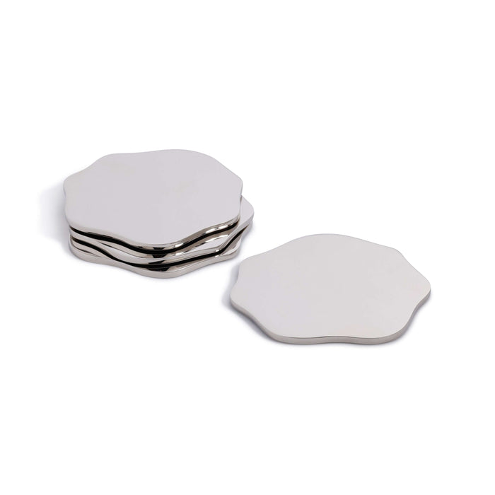 Set of silver hexagonal coasters on a white background