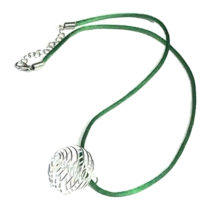 One green necklace with silver cage
