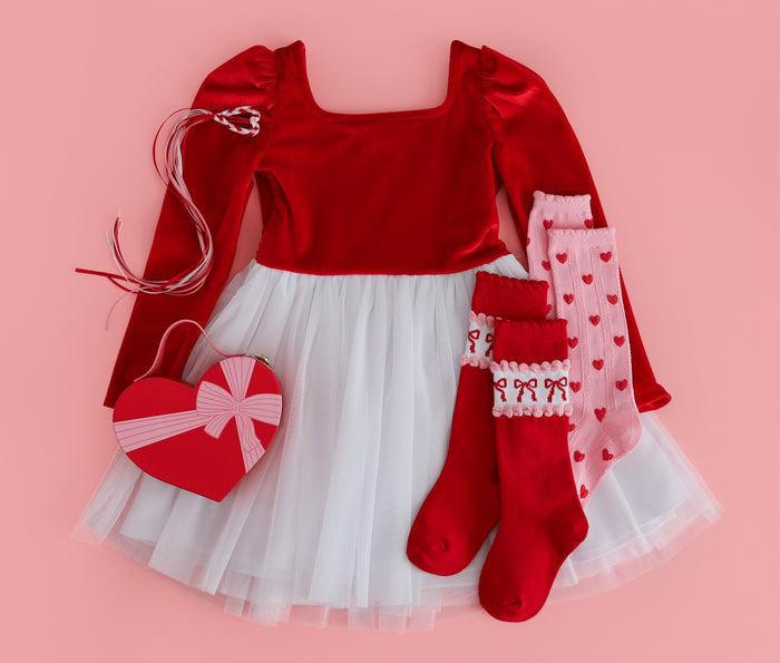 girls red and white long sleeve velvet tutu dress with matching Valentine's day socks and hair accessory