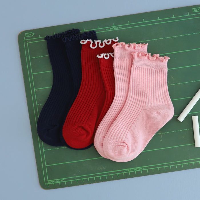 trio of little girls' lettuce trim midis in navy, red and pink for back to school