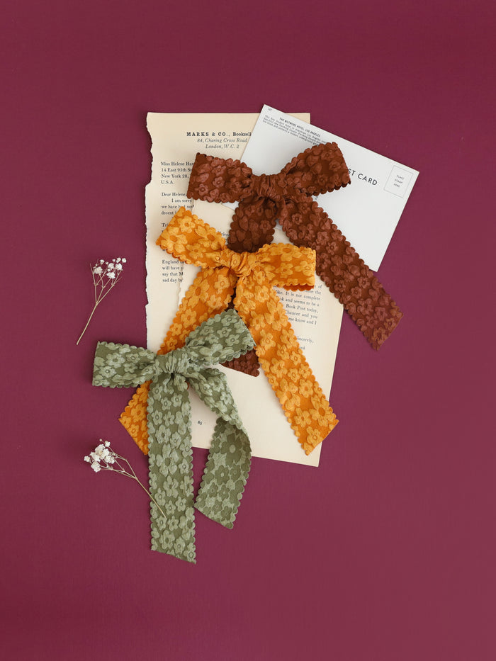 girls' floral bows with scalloped edges in olive, mustard and brown to match fall collection