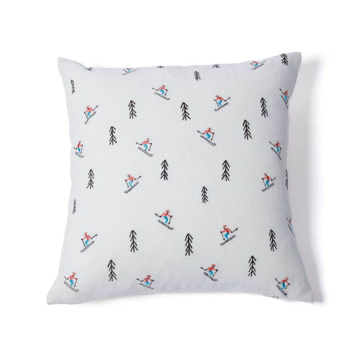 Pillow with skiing pattern on a white background