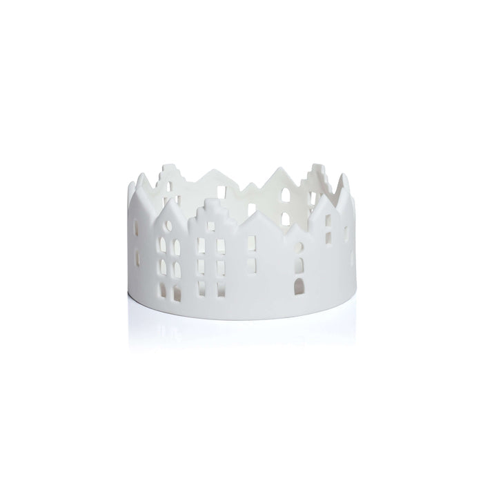 White decorative basket with cut-out patterns on a white background