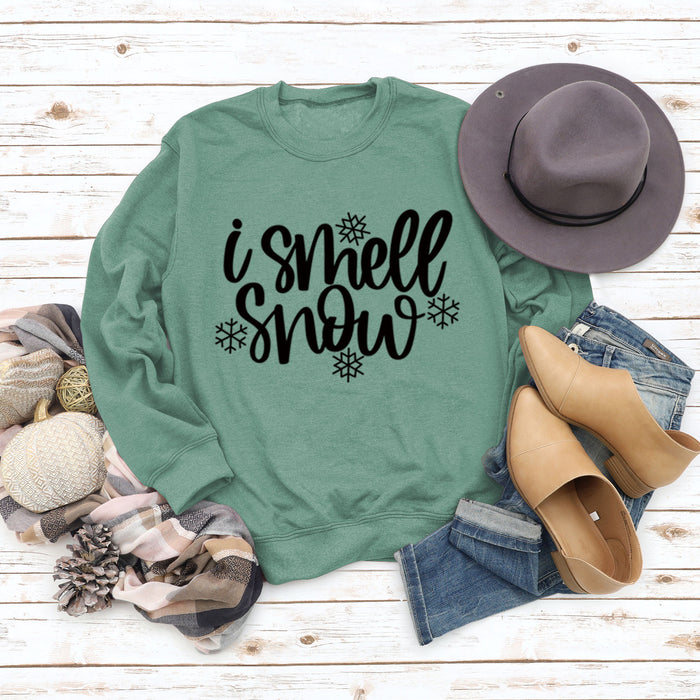 Light green sweater (black font) / S
