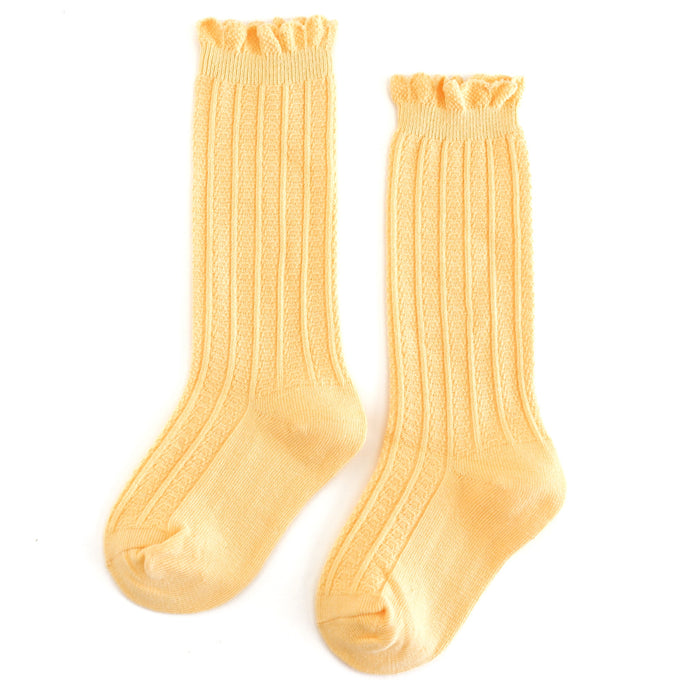 girls' pastel yellow knee high socks with dainty scalloped trim for spring