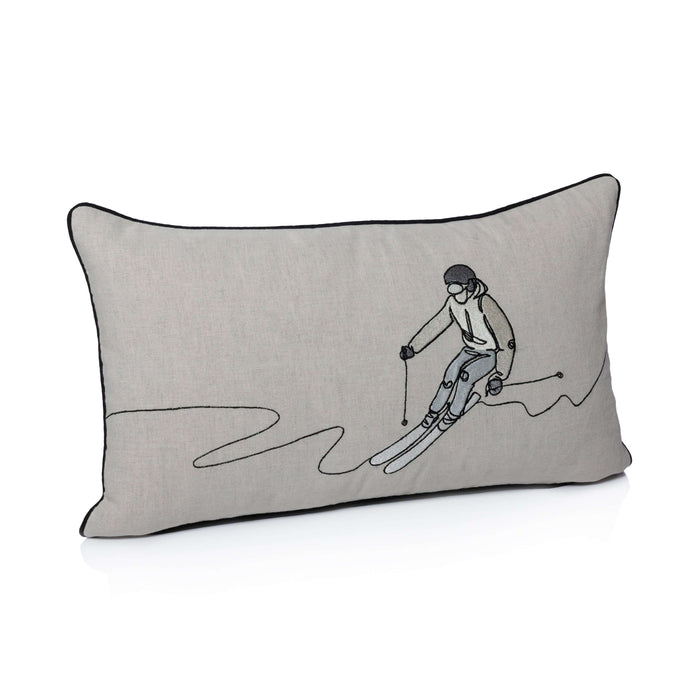 Gray pillow with a skier design on a white background