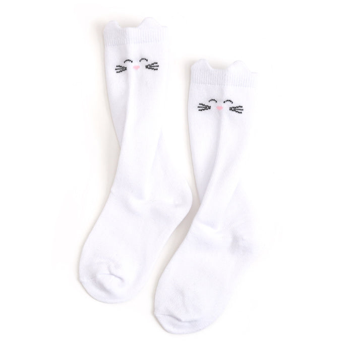 girl's white knee high socks with ears and print of cat whiskers, eyes and nose