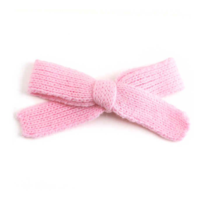 girls' pink yarn knit hair bow on alligator clip